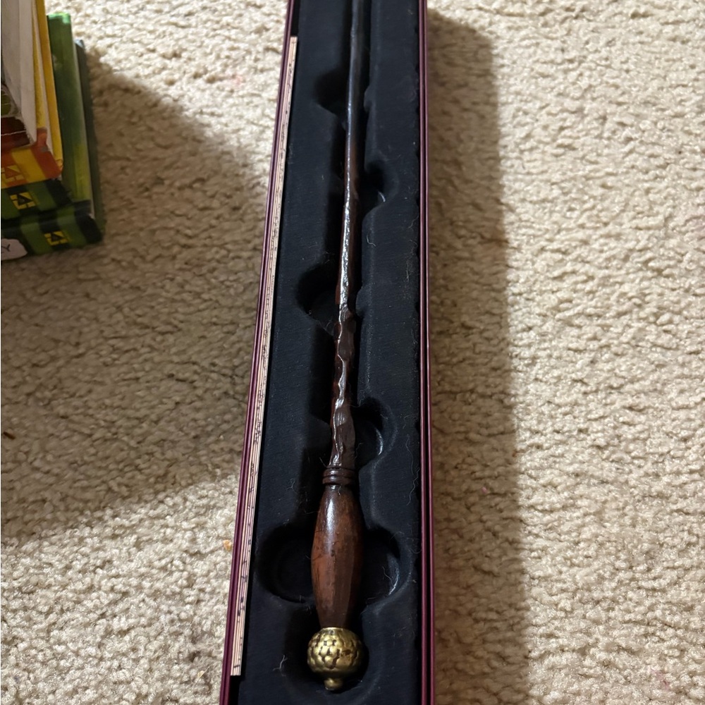 Elegant Brown Wand with Gold Accent ollivanders